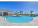 Resort-style pool with lounge chairs and covered seating at 419 157Th E Ct, Bradenton, FL 34212