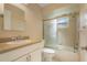 Bathroom with single sink, shower/tub combo, and white cabinets at 4279 Oakhurst E Cir # 3044, Sarasota, FL 34233