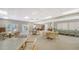 Bright and airy community room with multiple seating areas at 4540 Gulf Of Mexico Dr # 304, Longboat Key, FL 34228