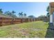 Large backyard with wooden fence at 4905 22Nd E Ct, Bradenton, FL 34203