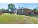 Backyard view of home with solar panels at 4905 22Nd E Ct, Bradenton, FL 34203
