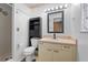 Clean bathroom with vanity, toilet and shower/tub combo at 4905 22Nd E Ct, Bradenton, FL 34203