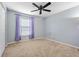 Bedroom with ceiling fan and purple curtains at 4905 22Nd E Ct, Bradenton, FL 34203