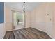 Dining room with hardwood floors and neutral-colored walls at 4905 22Nd E Ct, Bradenton, FL 34203