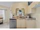 Bright kitchen features stainless steel dishwasher and ample counter space at 4905 22Nd E Ct, Bradenton, FL 34203