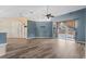 Bright living room featuring hardwood floors and access to a back patio at 4905 22Nd E Ct, Bradenton, FL 34203