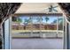 Screened porch with ceiling fan overlooking backyard at 4905 22Nd E Ct, Bradenton, FL 34203