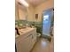 Bathroom with white vanity and a shower stall at 5443 Avenida Del Mare, Sarasota, FL 34242