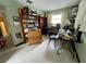 Bedroom with built-in bookshelves and a small desk at 5443 Avenida Del Mare, Sarasota, FL 34242