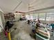 Florida room with pool view and storage shelves at 5443 Avenida Del Mare, Sarasota, FL 34242