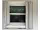 White window with adjustable shutters at 5443 Avenida Del Mare, Sarasota, FL 34242