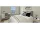 Bedroom featuring a neatly made bed, and a workstation at 5548 Summit Gln, Bradenton, FL 34203