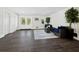 Bright and airy basement with comfortable seating and plenty of natural light at 598 Lyons Ln, Longboat Key, FL 34228