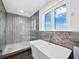 Bathroom with a walk-in shower and a free-standing bathtub at 598 Lyons Ln, Longboat Key, FL 34228