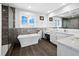 Spa-like bathroom with soaking tub, walk-in shower, and dual vanity at 598 Lyons Ln, Longboat Key, FL 34228