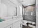 Clean bathroom with a walk-in shower and a white vanity at 598 Lyons Ln, Longboat Key, FL 34228