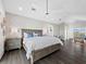 Main bedroom with a king-size bed and an ensuite bathroom at 598 Lyons Ln, Longboat Key, FL 34228