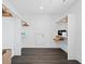 Large walk-in closet with ample hanging and shelving space at 598 Lyons Ln, Longboat Key, FL 34228