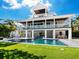 Two-story home with a pool and spacious backyard at 598 Lyons Ln, Longboat Key, FL 34228