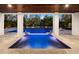 Spa with a view of the pool and lush landscaping at 598 Lyons Ln, Longboat Key, FL 34228