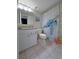 Bright bathroom features a white vanity and a charming shower curtain with sea turtle design at 6158 Palma Del Mar S Blvd # 306, St Petersburg, FL 33715