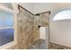 Large walk-in shower with tile surround and bench at 6338 Stone River Rd, Bradenton, FL 34203