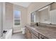 Bathroom with vanity, bathtub, and modern finishes at 6615 Hunter Combe Xing, University Park, FL 34201