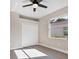 Bright bedroom with large window and ceiling fan at 6615 Hunter Combe Xing, University Park, FL 34201