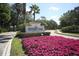 University Park Country Club entrance with lush landscaping at 6615 Hunter Combe Xing, University Park, FL 34201