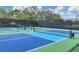 Two well-maintained pickleball courts at 6615 Hunter Combe Xing, University Park, FL 34201