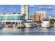 Luxury yachts docked at a marina with city skyline at 7820 Ontario Street Cir, Sarasota, FL 34243