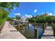 Well-maintained boat dock featuring sturdy wooden planks and picturesque waterfront views at 1249 S Basin Ln, Sarasota, FL 34242