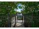 This property features a private boat dock with lift, perfect for waterfront living and boating enthusiasts at 1249 S Basin Ln, Sarasota, FL 34242
