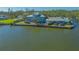 Waterfront home with lush landscaping, pool, and canal access, perfect for luxury living at 1249 S Basin Ln, Sarasota, FL 34242
