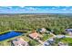 Aerial view highlighting the home's private backyard setting at 17113 1St E Dr, Bradenton, FL 34212