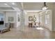 Bright dining room features a wood table with seating for six and a large mirror at 17113 1St E Dr, Bradenton, FL 34212