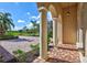 Front porch view of the property and neighborhood at 17113 1St E Dr, Bradenton, FL 34212