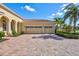 Three car garage with paver driveway at 17113 1St E Dr, Bradenton, FL 34212