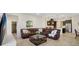 Open living space with sectional sofa, and kitchen views at 17113 1St E Dr, Bradenton, FL 34212