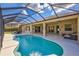 Screened pool and patio with outdoor furniture at 17113 1St E Dr, Bradenton, FL 34212