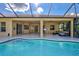 Screened pool and patio with outdoor furniture at 17113 1St E Dr, Bradenton, FL 34212