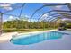 Screened pool and patio with outdoor furniture at 17113 1St E Dr, Bradenton, FL 34212