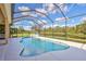 Relaxing pool area with screened enclosure, offering water views at 17113 1St E Dr, Bradenton, FL 34212