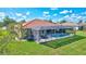 Private backyard with pool and spacious screened patio at 17113 1St E Dr, Bradenton, FL 34212