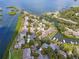 Aerial view of waterfront community with lush landscaping and boat docks at 1720 Glenhouse Dr # 330, Sarasota, FL 34231