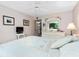 Main bedroom with window and white dresser at 1720 Glenhouse Dr # 330, Sarasota, FL 34231