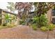Complex with lush landscaping and walkways at 1720 Glenhouse Dr # 330, Sarasota, FL 34231