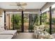 Relaxing sunroom with access to a private patio at 1720 Glenhouse Dr # 330, Sarasota, FL 34231
