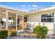 Relaxing screened patio with seating area, perfect for outdoor enjoyment at 20207 Gladstone Ave, Port Charlotte, FL 33952