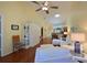 Living room with white furniture, hardwood floors, and built-in shelving at 2915 Oak Ln, Bradenton, FL 34209